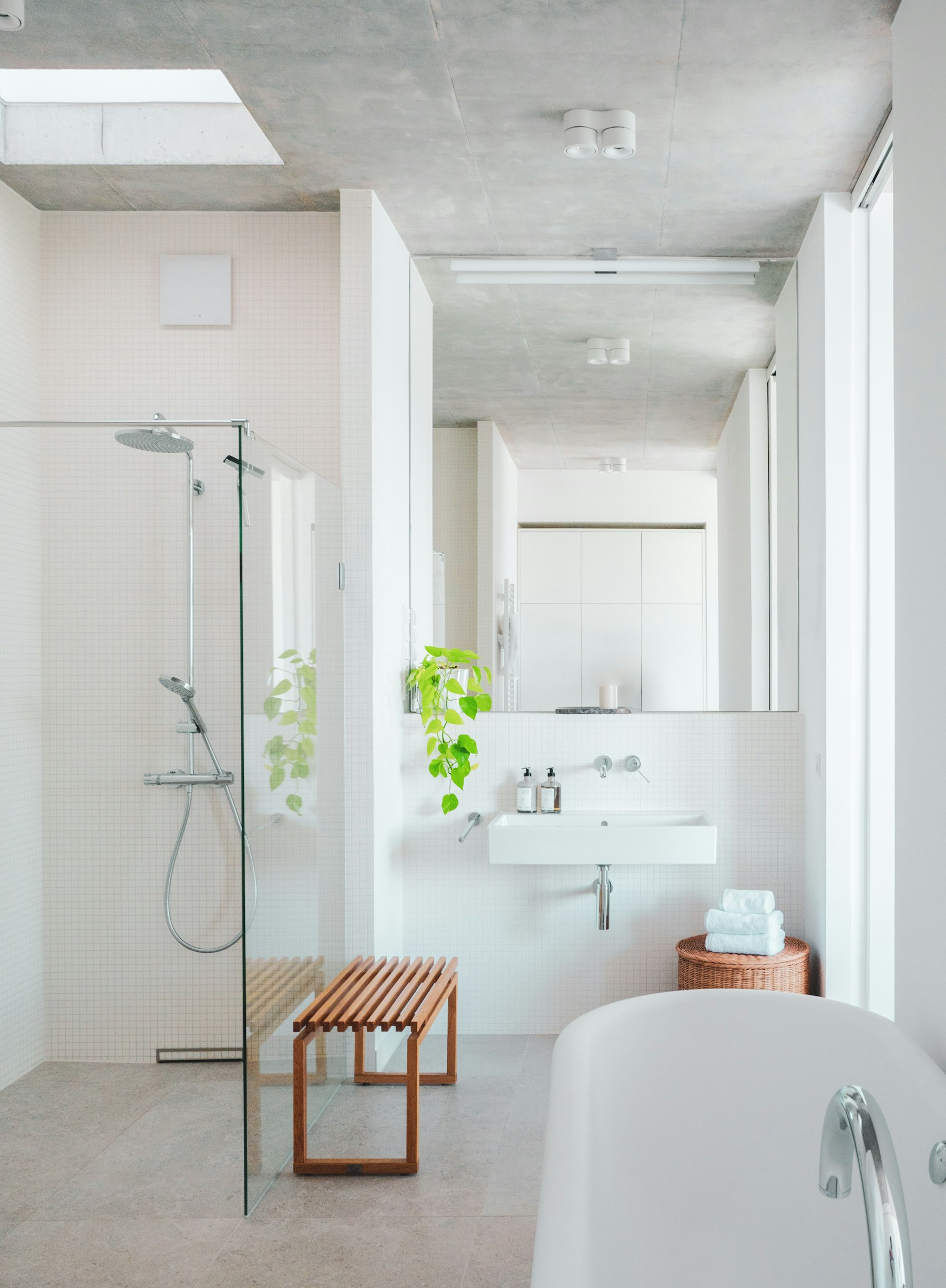 Spa-style bathroom with a freestanding tub and natural light
